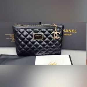 Chanel Black Quilted Cosmetic Bag with Gold Accents